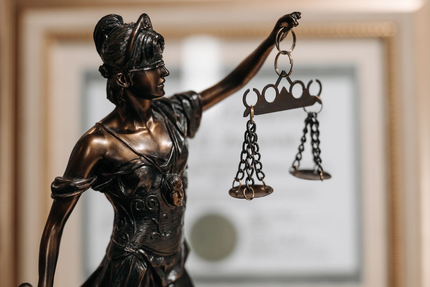 Statue of Lady Justice holding scales